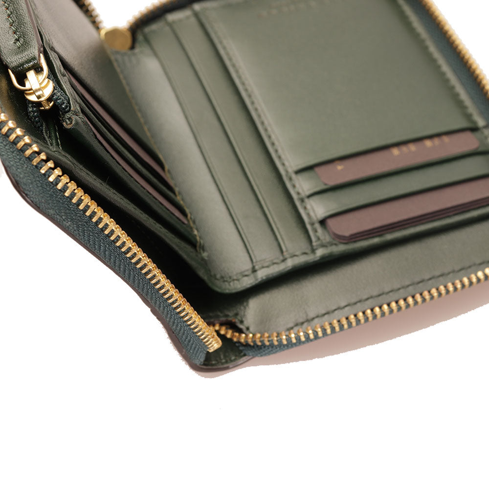 Kleine Damenbrieftasche mit Reißverschluss THE BRIDGE Domitilla-Linie aus grünem Leder