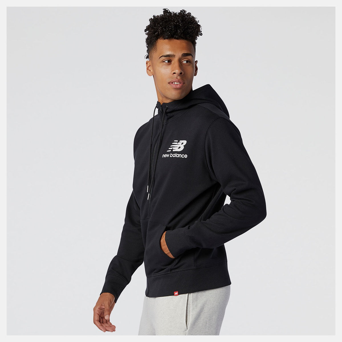 Felpa Uomo con Cappuccio NEW BALANCE linea Essentials Stacked Full Zip colore Black