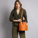 THE BRIDGE Damen-Beuteltasche aus orangefarbenem Leder der Story-Linie