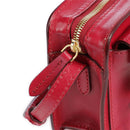 Kameratasche Damen-Umhängetasche THE BRIDGE Lucrezia-Linie aus beerenfarbenem Leder