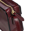 Damen-Umhängetasche/Kameratasche THE BRIDGE Lucrezia-Linie aus traubenfarbenem Leder