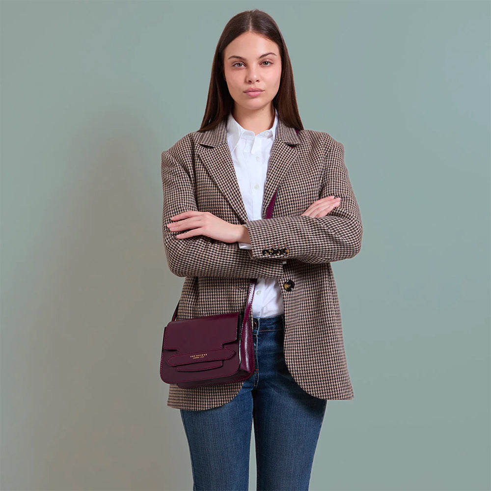 THE BRIDGE Damen-Umhängetasche, mittelgroß, Lucrezia-Linie aus lilafarbenem Leder