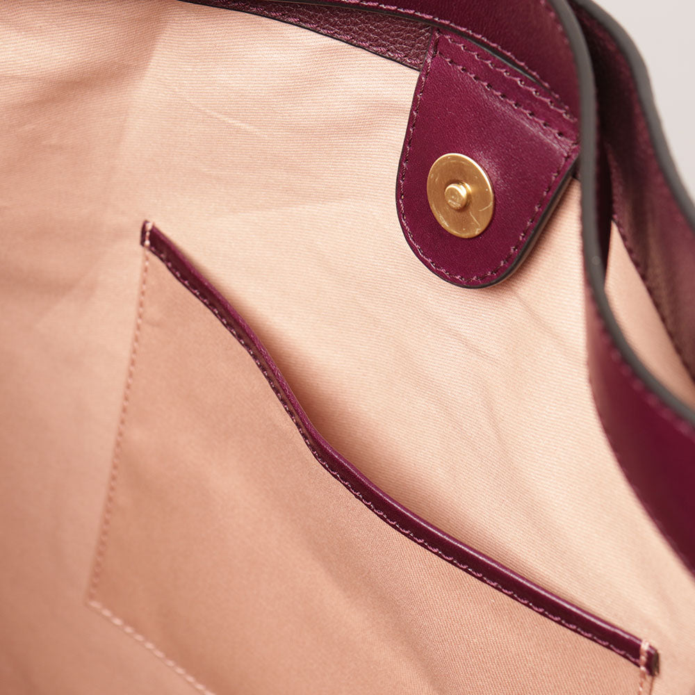 THE BRIDGE Elisabetta Linie Damenhandtasche mit Schultergurt aus lila Leder