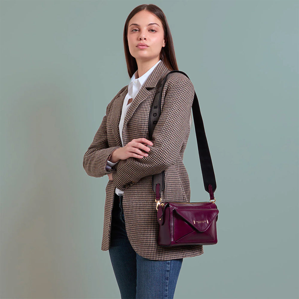 THE BRIDGE Damen-Umhängetasche Frida-Linie aus lila Leder