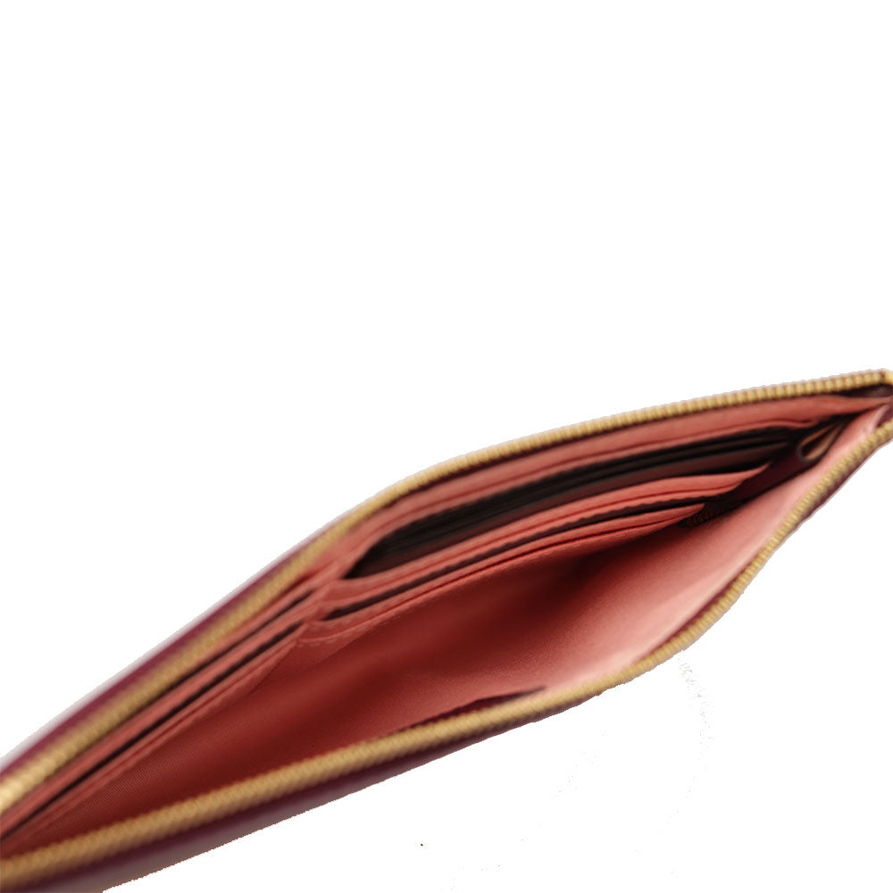 THE BRIDGE Mittelgroße Damen-Clutch mit Armband, Lucrezia-Linie, aus lila Leder