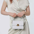 Borsa Donna a Mano con Tracolla COCCINELLE in Pelle linea Binxie Small colore Tangerine
