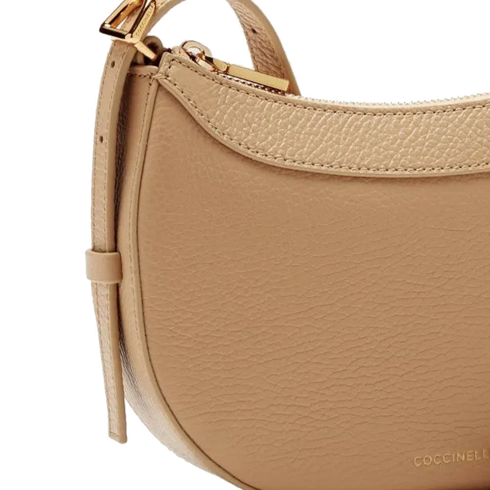 COCCINELLE Damen Umhängetasche aus frischem beigefarbenem Leder Whisper Line