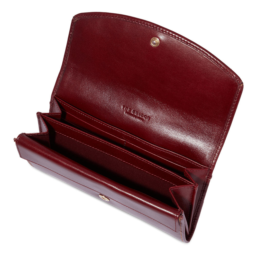 Damenbrieftasche mit Knopf THE BRIDGE Bettina-Linie aus bordeauxrotem Leder