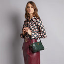 THE BRIDGE Mini-Umhängetasche für Damen aus grünem Leder der Story-Linie