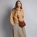 THE BRIDGE DORA LINIE
Kleine Damen Umhängetasche aus braunem Leder