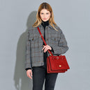 THE BRIDGE Damenhandtasche Biba-Linie aus braunem Leder