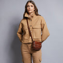 THE BRIDGE Damen-Mini-Umhängetasche Bettina-Linie aus schwarzem Leder