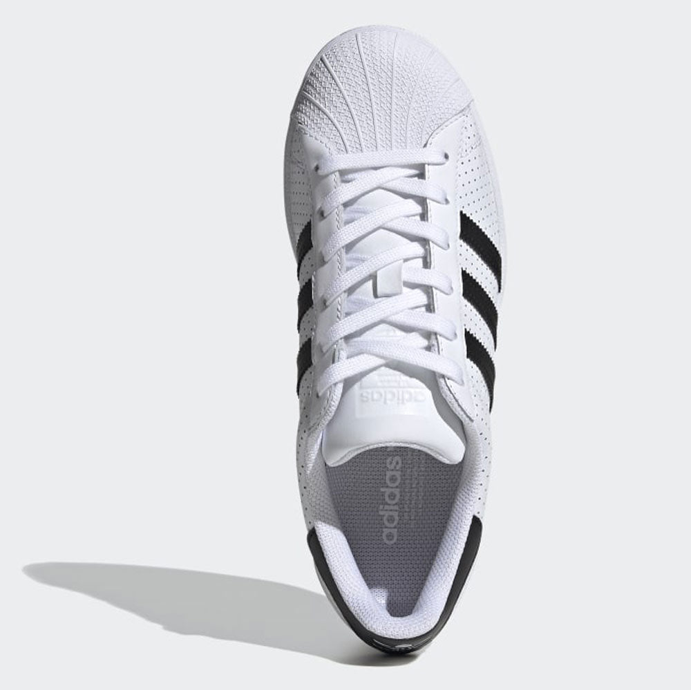 Sneakers Basse In Pelle Colore Bianco Con Punta In Camoscio Colore Salmone E Freccia Laterale Con Borchiette Sneakers Basse In Pelle Colore Bianco Con Punta In Camoscio Colore Salmone E Freccia Laterale Con Borchiette