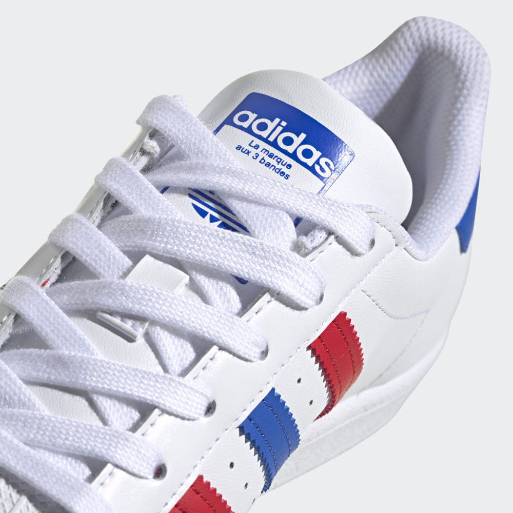 Scarpe Donna ADIDAS Sneakers linea Superstar J in Pelle Bianco Blu e Rosso a sconto Cuoieriashop