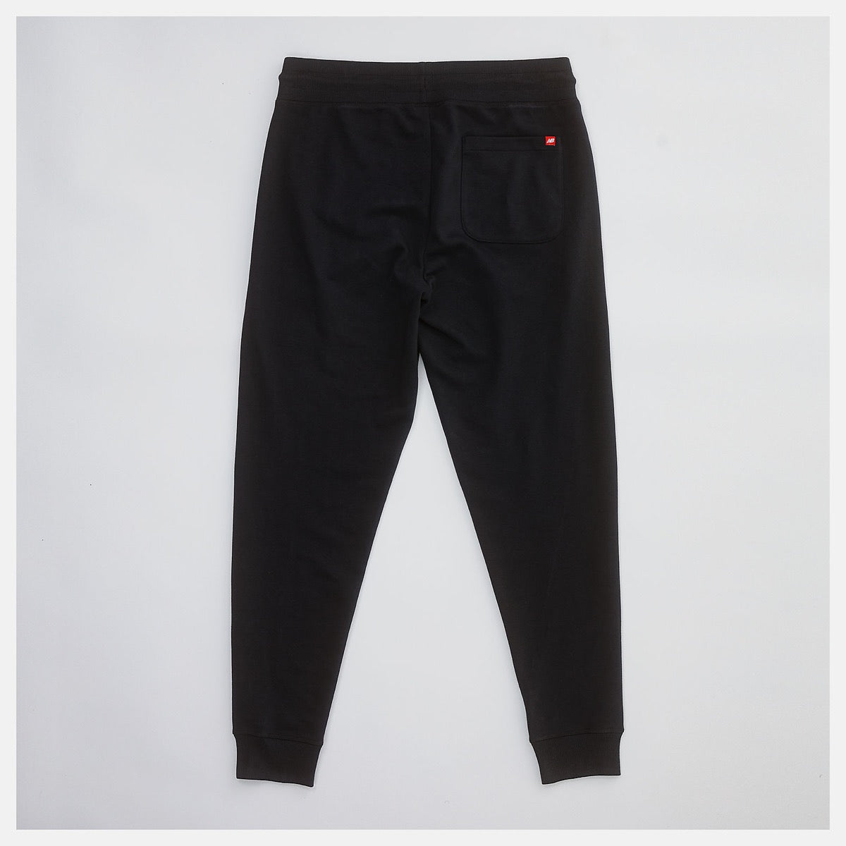 NEW BALANCE Herrenhose Essentials-Linie Stacked Logo Jogginghose Farbe Schwarz