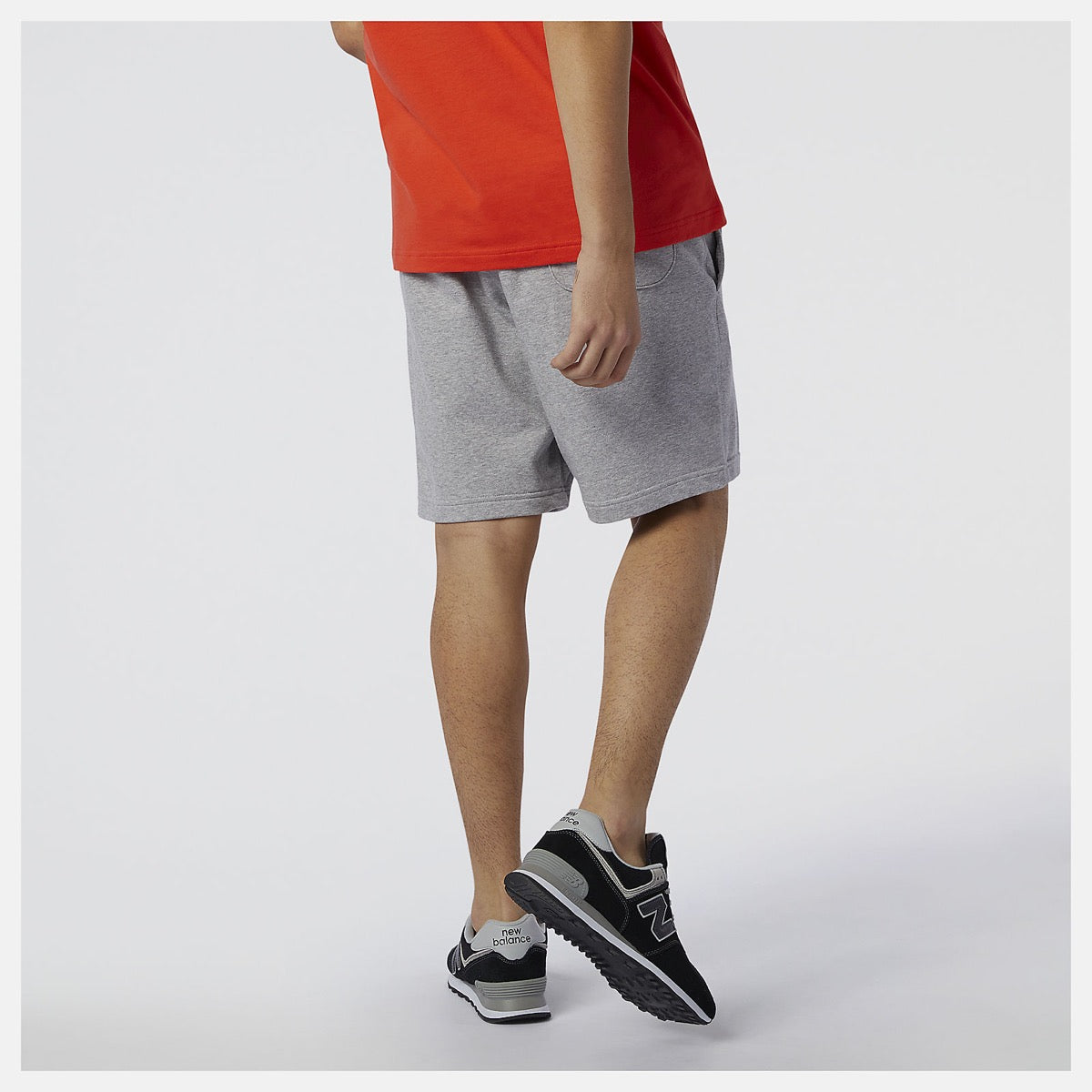 Pantaloncini Uomo NEW BALANCE linea Essentials Stacked Logo colore Athletic Grey